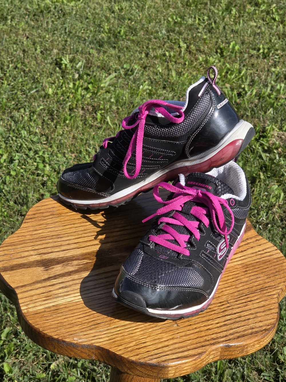 Skechers Women's Black Athletic Sneakers with Pink Accents